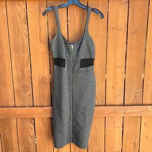 This MIDI dress is so flattering. It has a front zipper with a black mesh